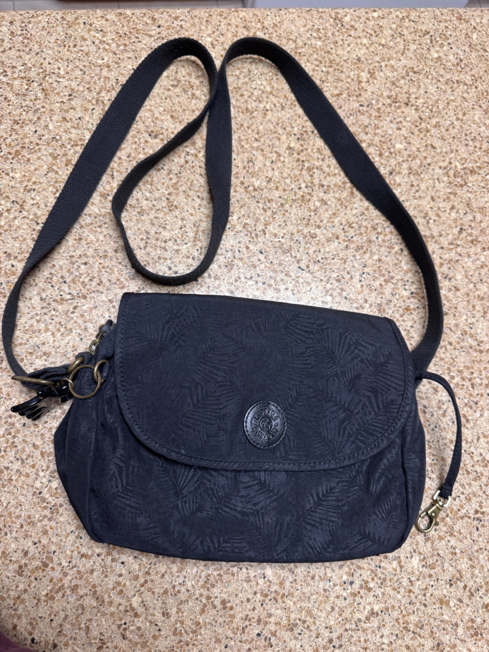 Kipling Cat Black Crossbody Shoulder Bag with Textured Leaf Pattern